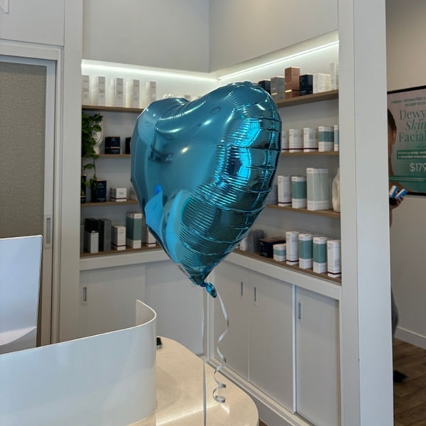 Face Fit clinic with birthday balloon floating