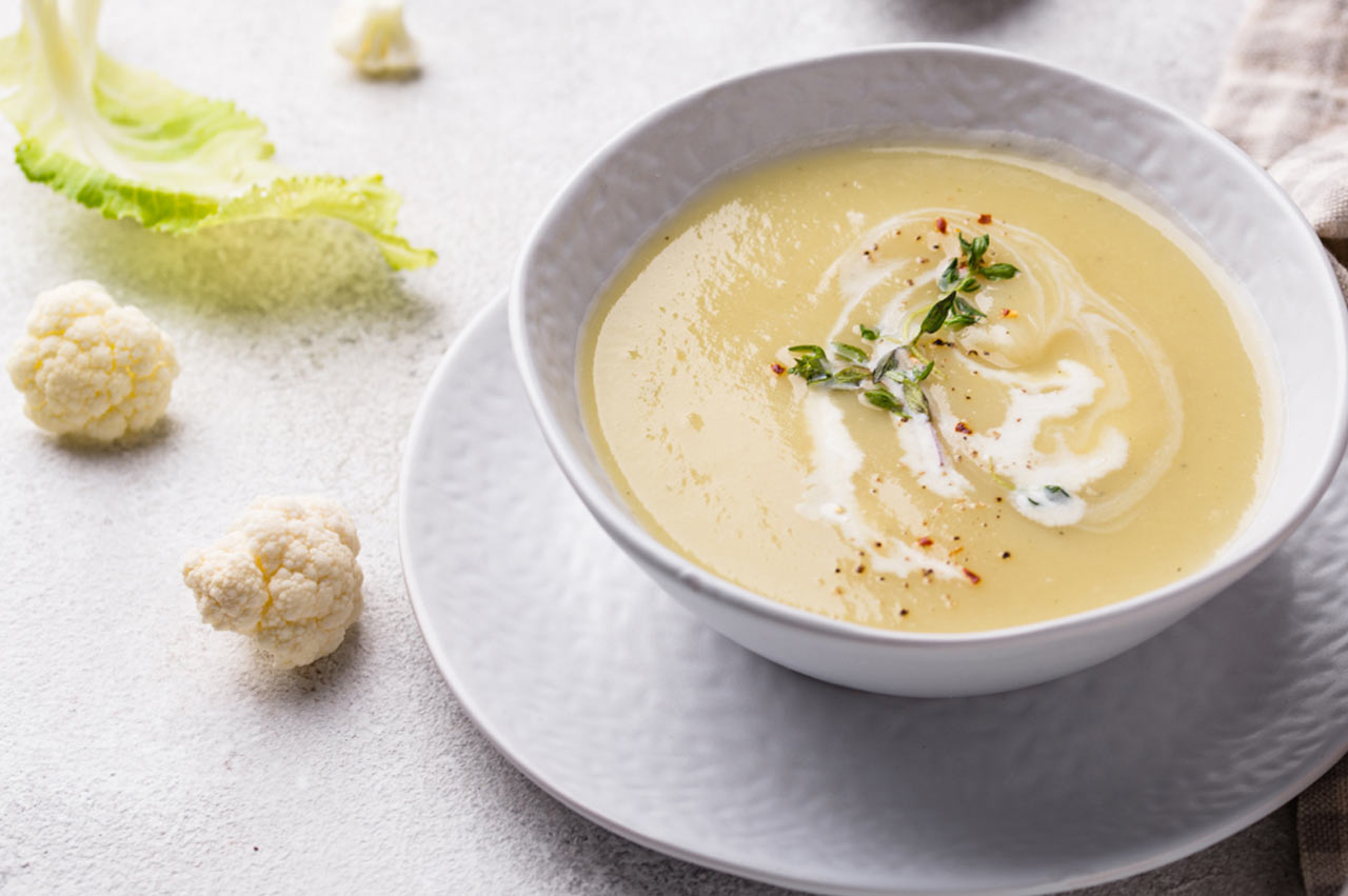 A single bowl of nourishing warm cauliflower soup