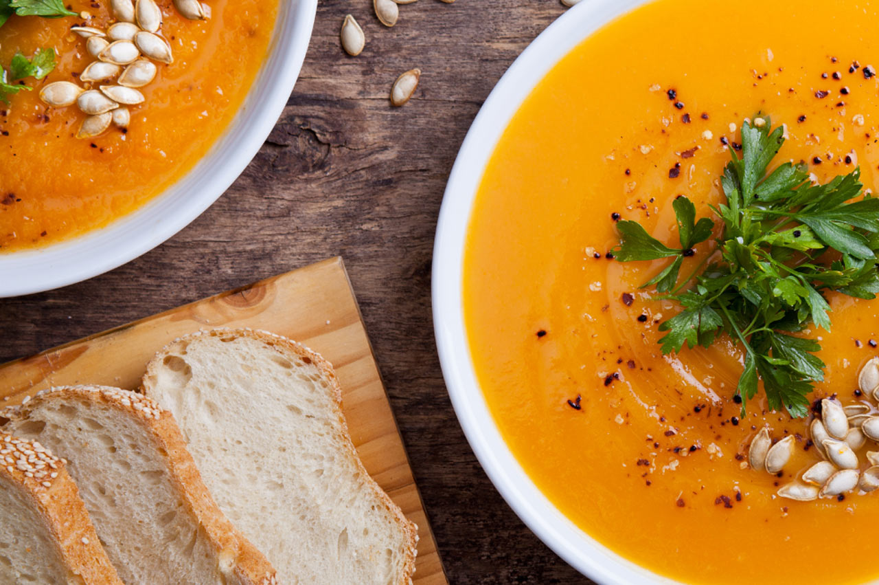 Two bowls of tantalising spicy Thai pumpkin soup