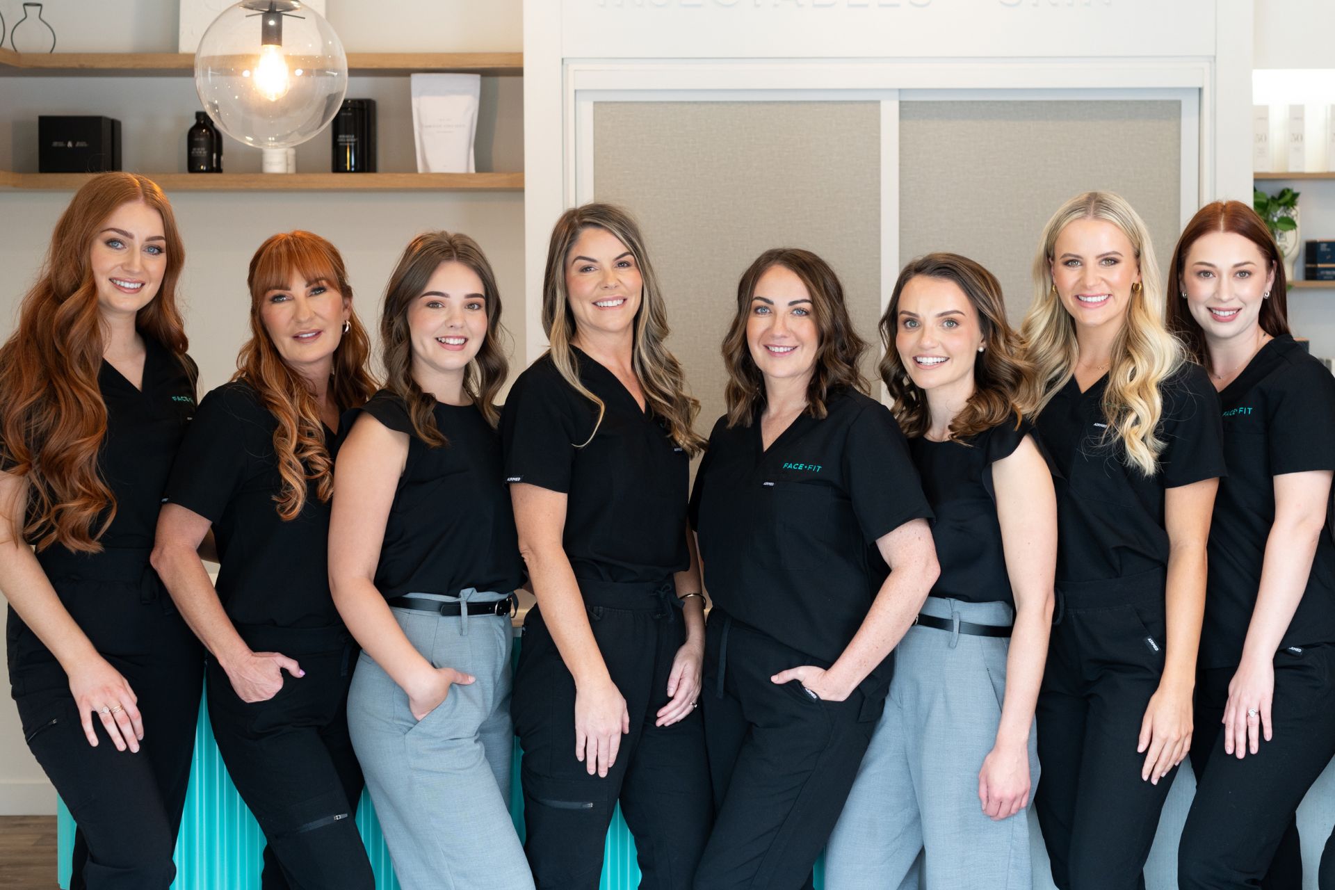 The face Fit team standing at reception